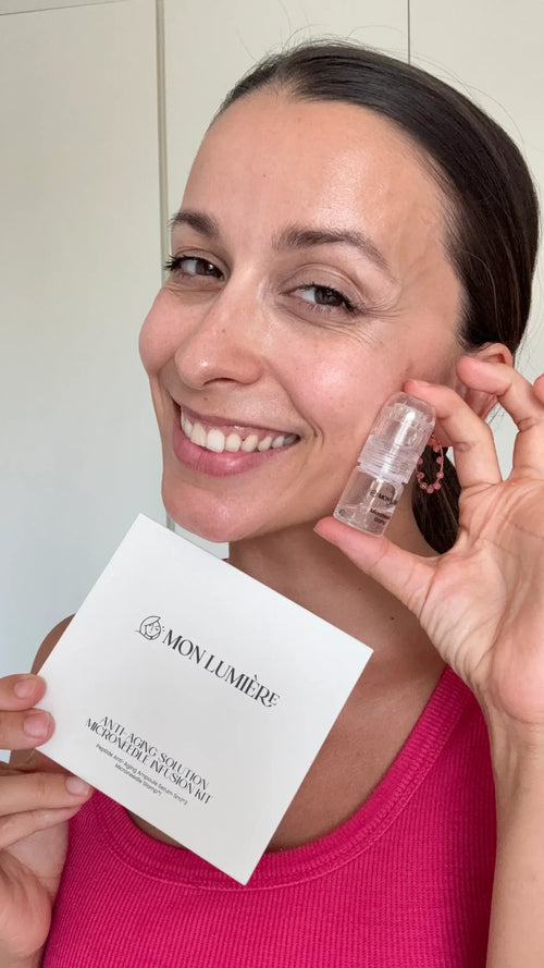 Woman holding a skincare product and packaging with 'Mon Lumiere' branding.